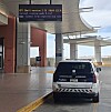 Airport sign EFI Shell screen appears at Phoenix car rental building